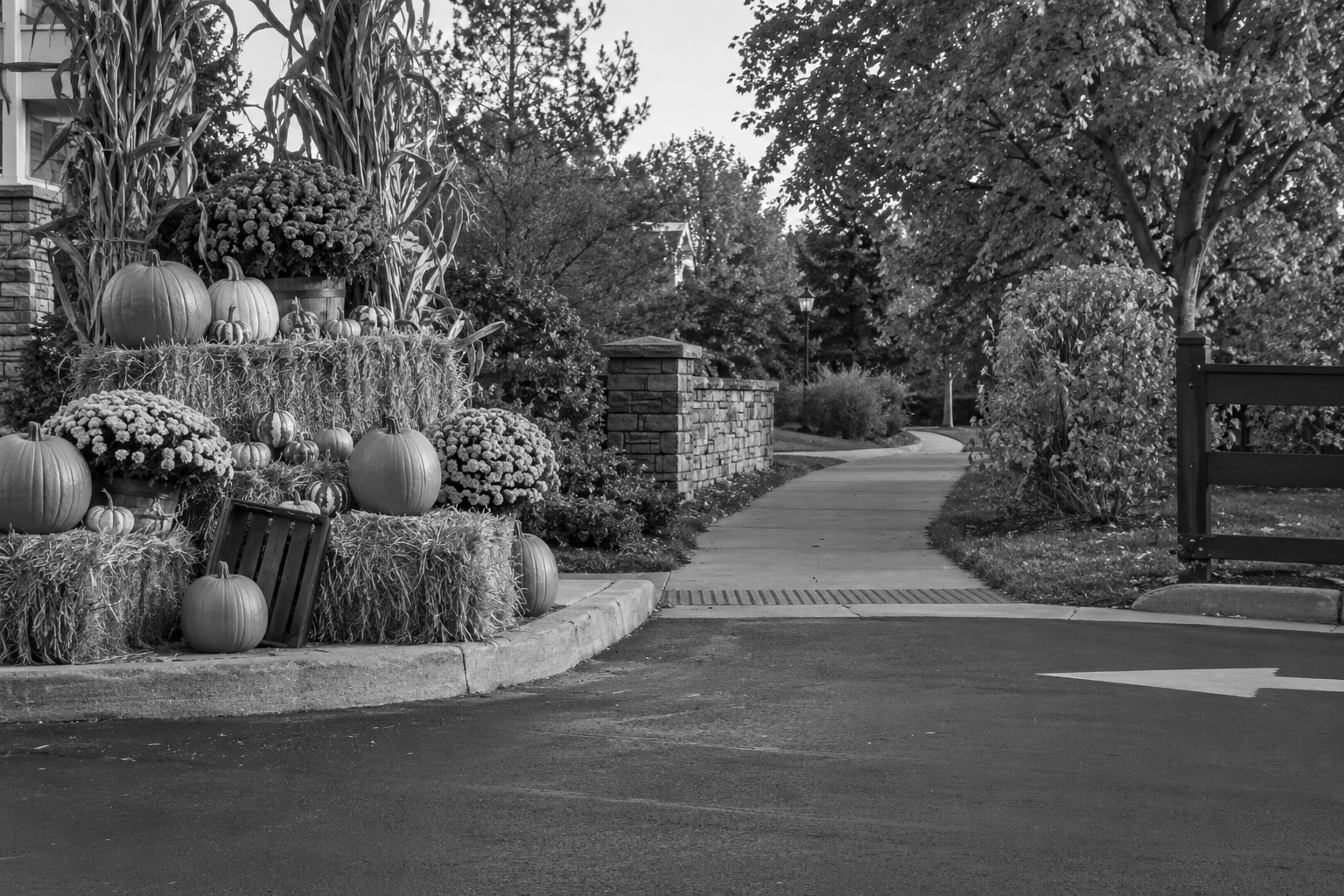 Decorative displays beside a driveway and pedestrian route