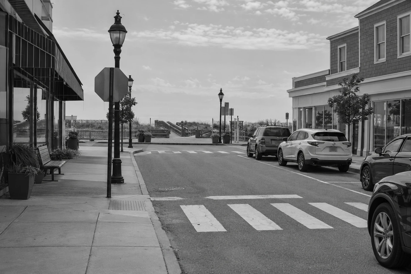 Pedestrian crosswalk at an empty shore-town intersection