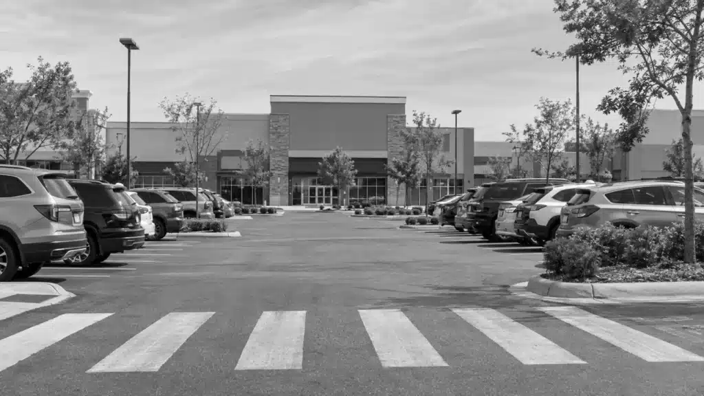 Commercial parking lot with a marked pedestrian crossing
