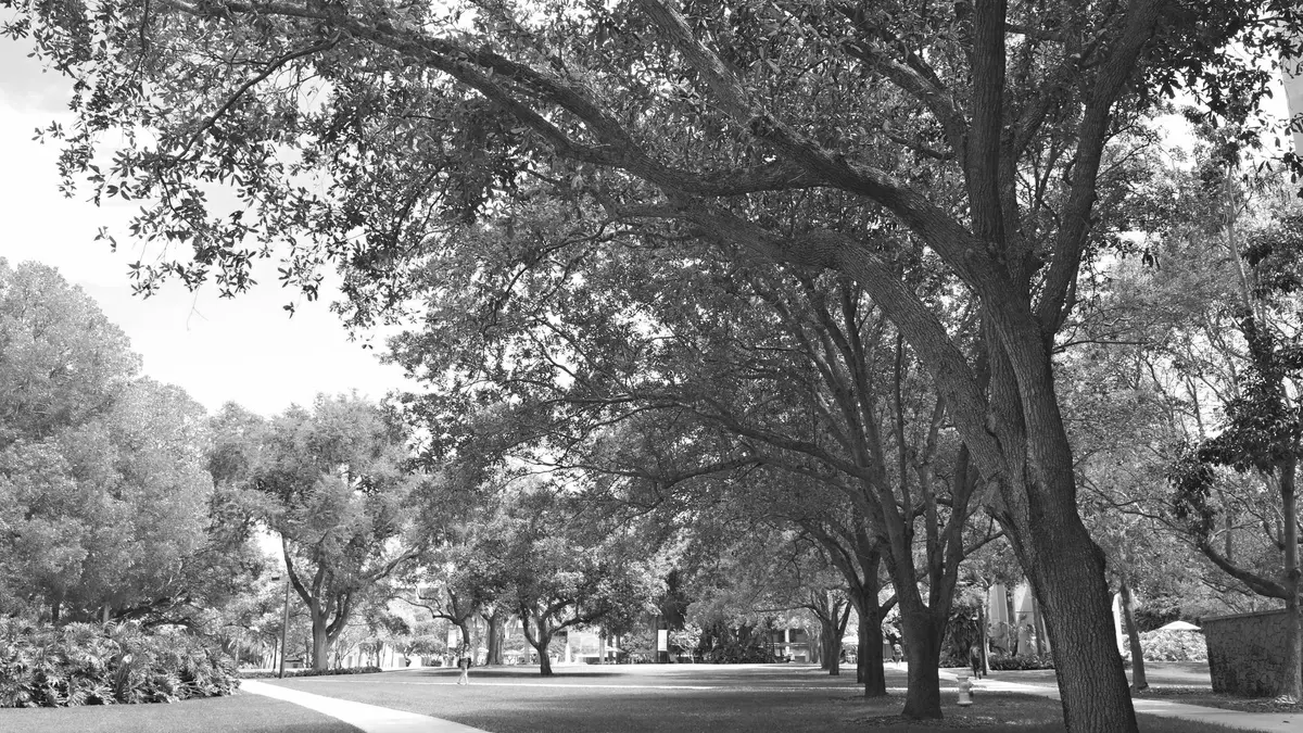 Grayscale stock photograph illustrating resident relative coverage college
