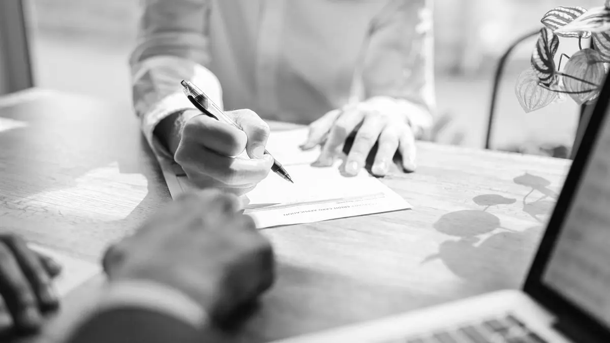 Grayscale stock photograph illustrating health settlement