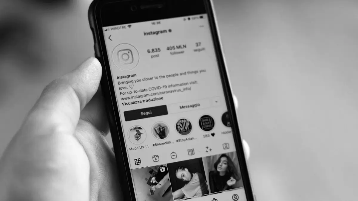 Grayscale stock photograph illustrating private social media injury
