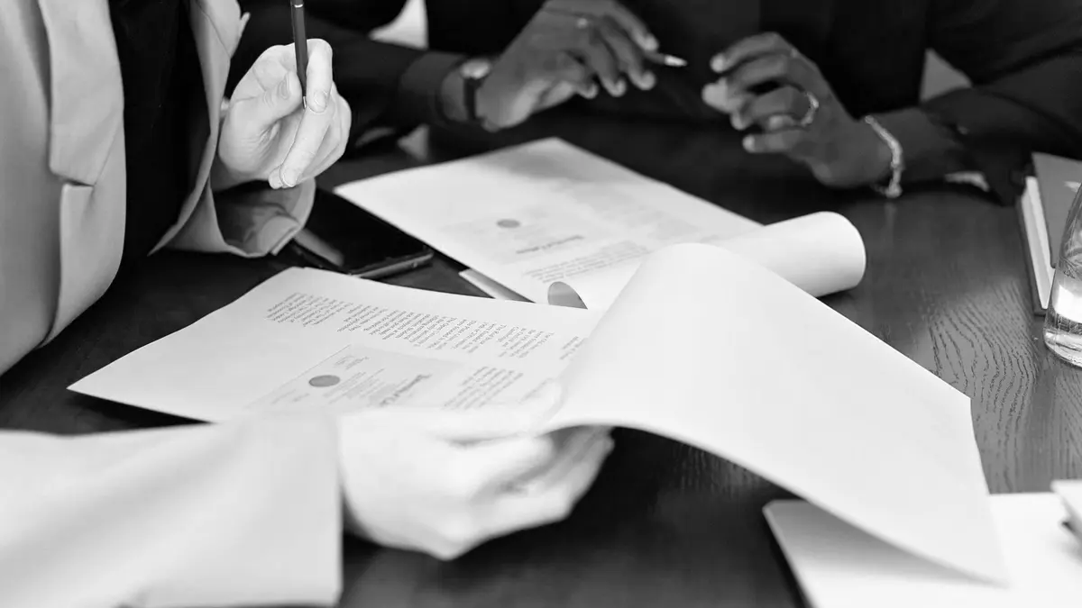Grayscale stock photograph illustrating uim higher than liability