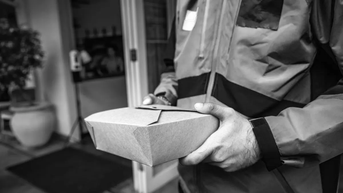 Grayscale stock photograph illustrating independent contractor label case