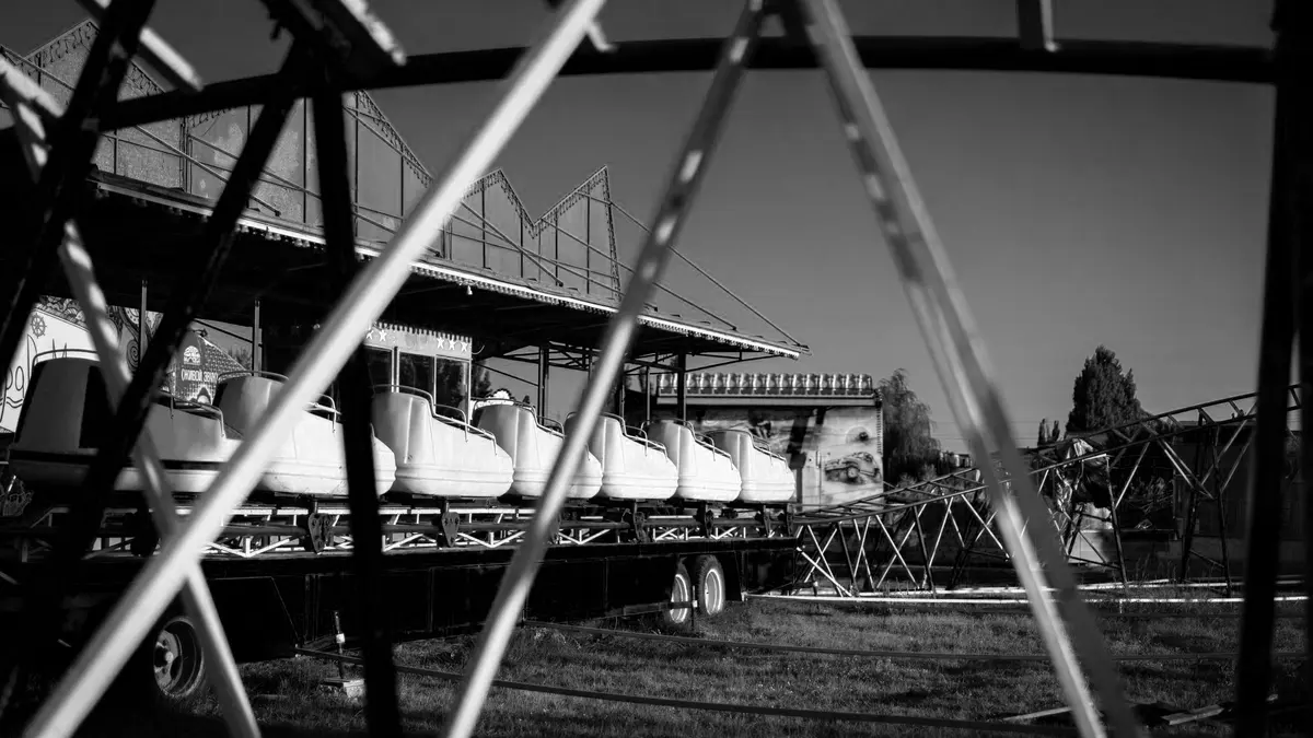 Grayscale stock photograph illustrating regulate carnival amusement ride