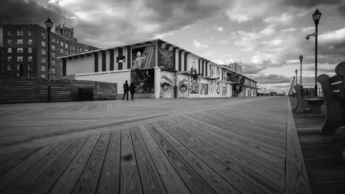 Grayscale stock photograph illustrating injured jersey shore boardwalk