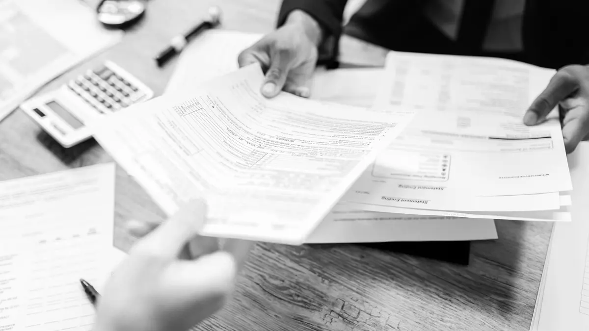 Grayscale stock photograph illustrating insurance premium increase