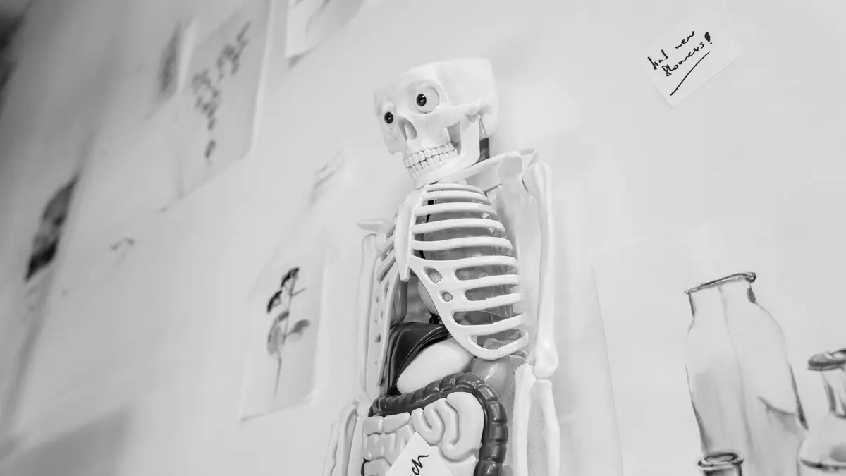 Grayscale stock photograph illustrating neck pain