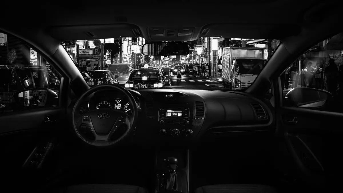 Grayscale stock photograph illustrating uber driver not fault