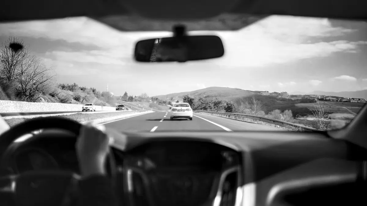 Grayscale stock photograph illustrating uber driver waiting request