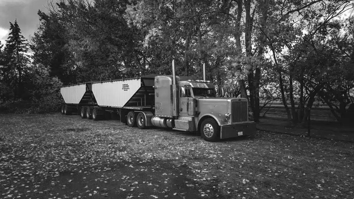 Grayscale stock photograph illustrating truck wide turn blind