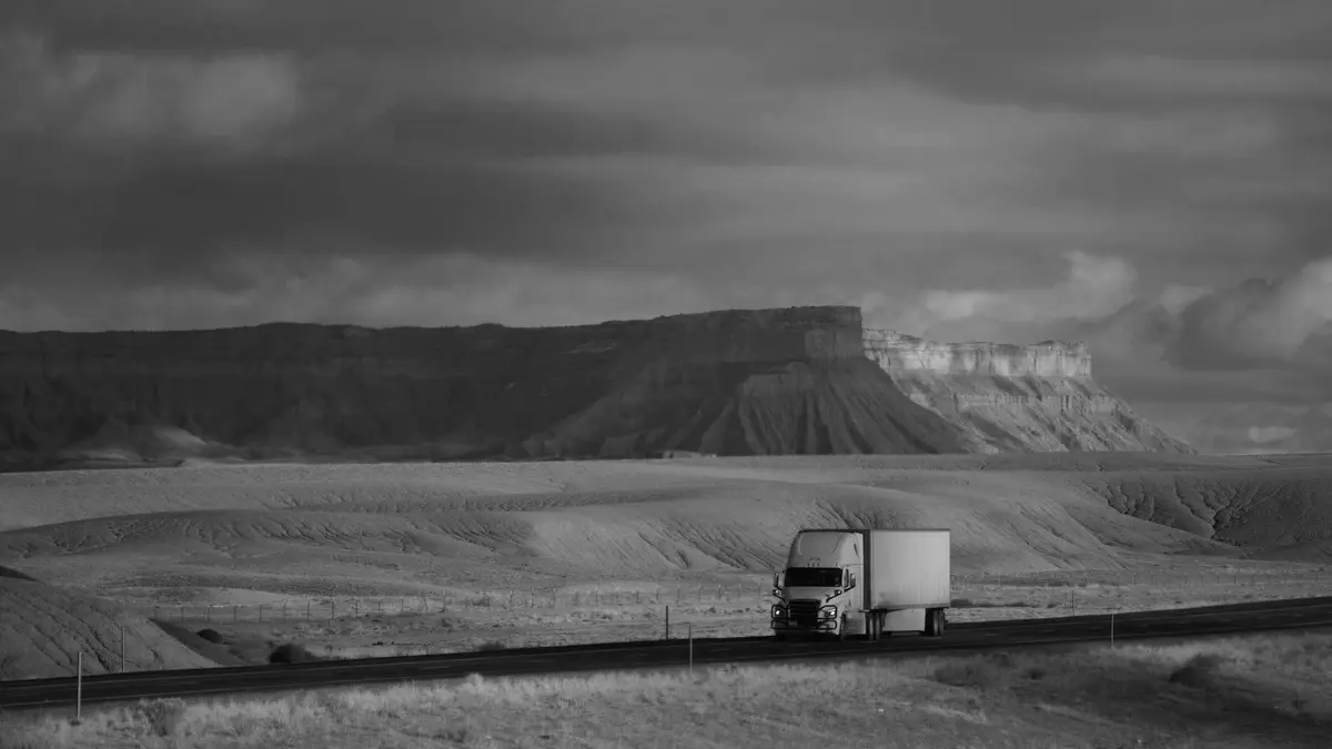 Grayscale stock photograph illustrating companies appear in one truck